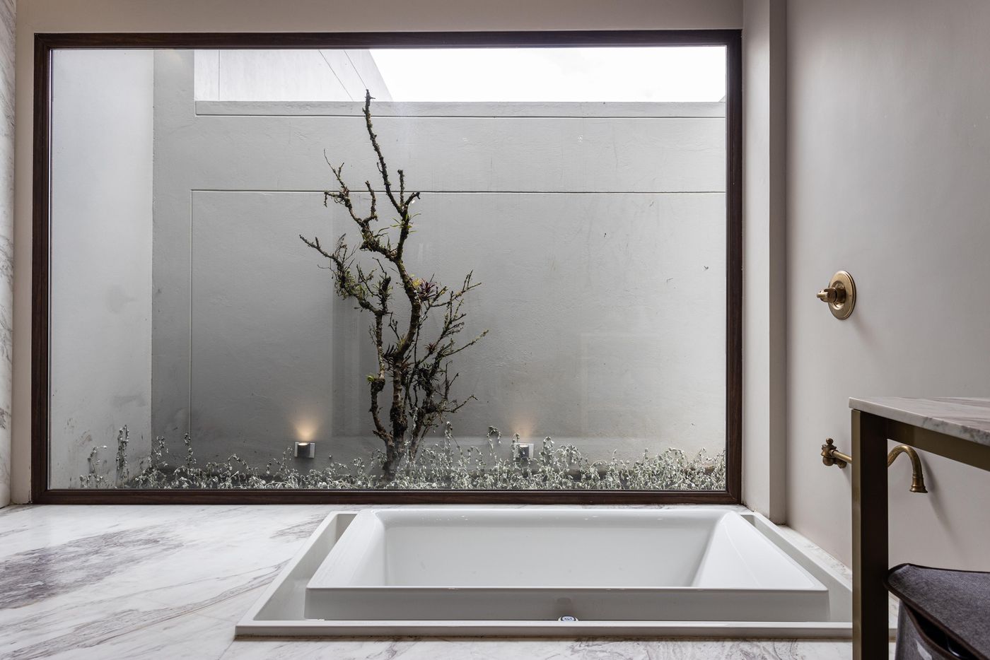 Bathroom with a large window — illustrative stock photograph