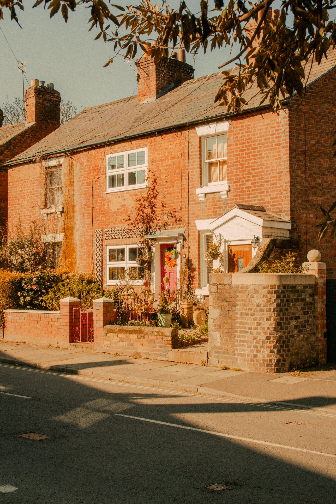 Traditional brick homes on a British street — illustrative stock photograph